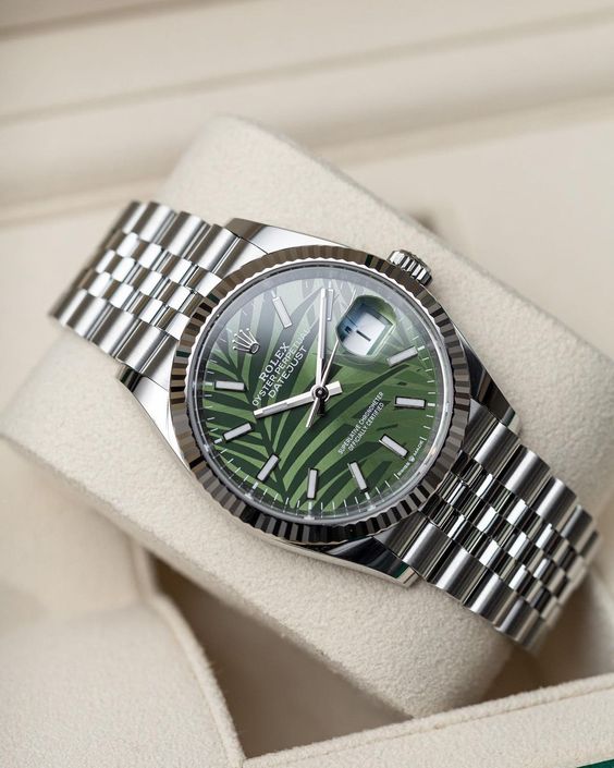 Rolex Watch with green Dial