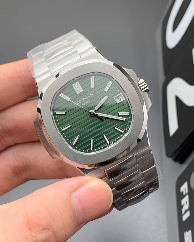 Patek Philippe silver with green dial