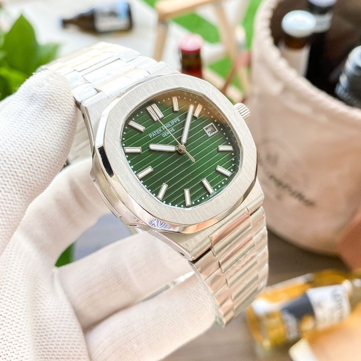 Patek Philippe silver with green dial