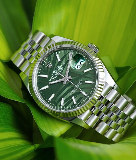 Rolex Watch with green Dial